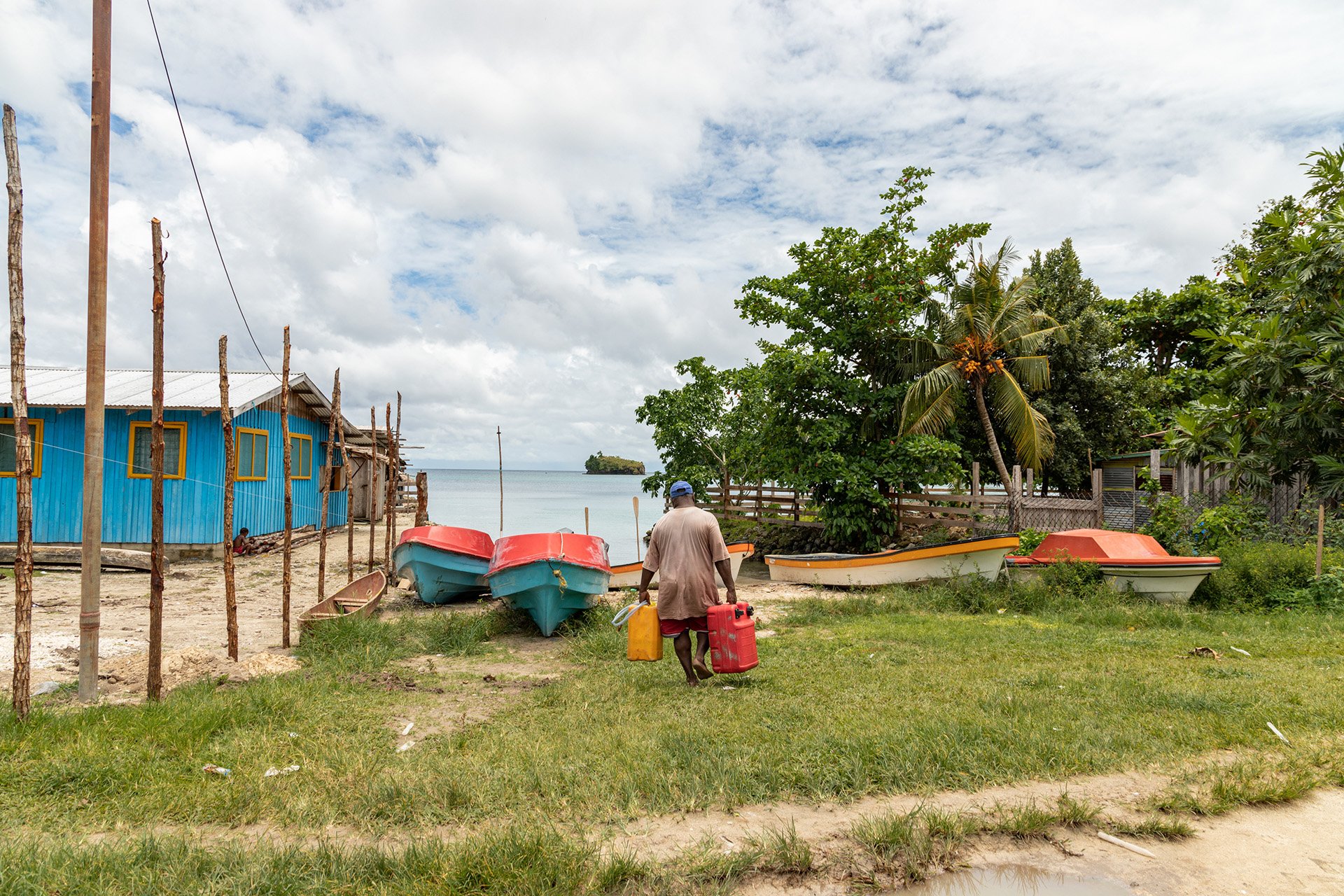 a peron carrying petrol to their boat