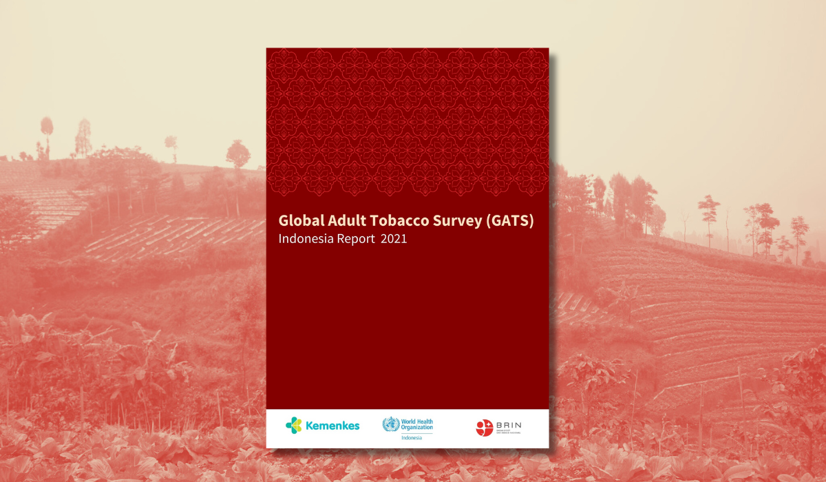photo of GATS publication with red cover on top of a picture of a landscape